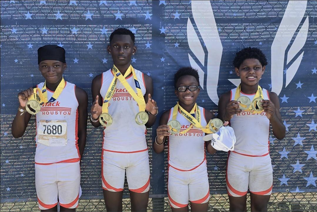 11-12 Boys 4x400m relay on the podium at the 2026 National Junior Olympics