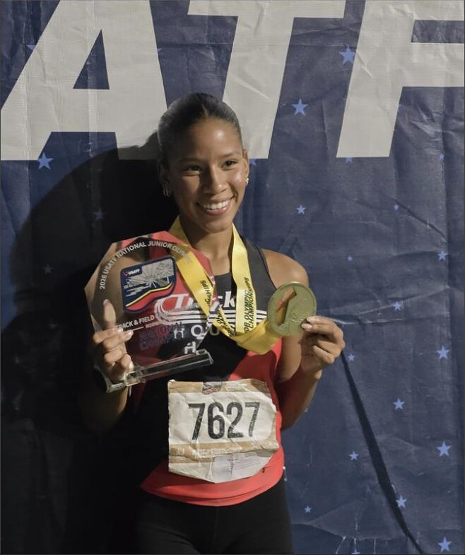 Brooklyn Allen on the podium at the 2026 National Junior Olympics