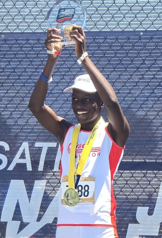 Thomas Holmes III on the podium at the 2026 National Junior Olympics